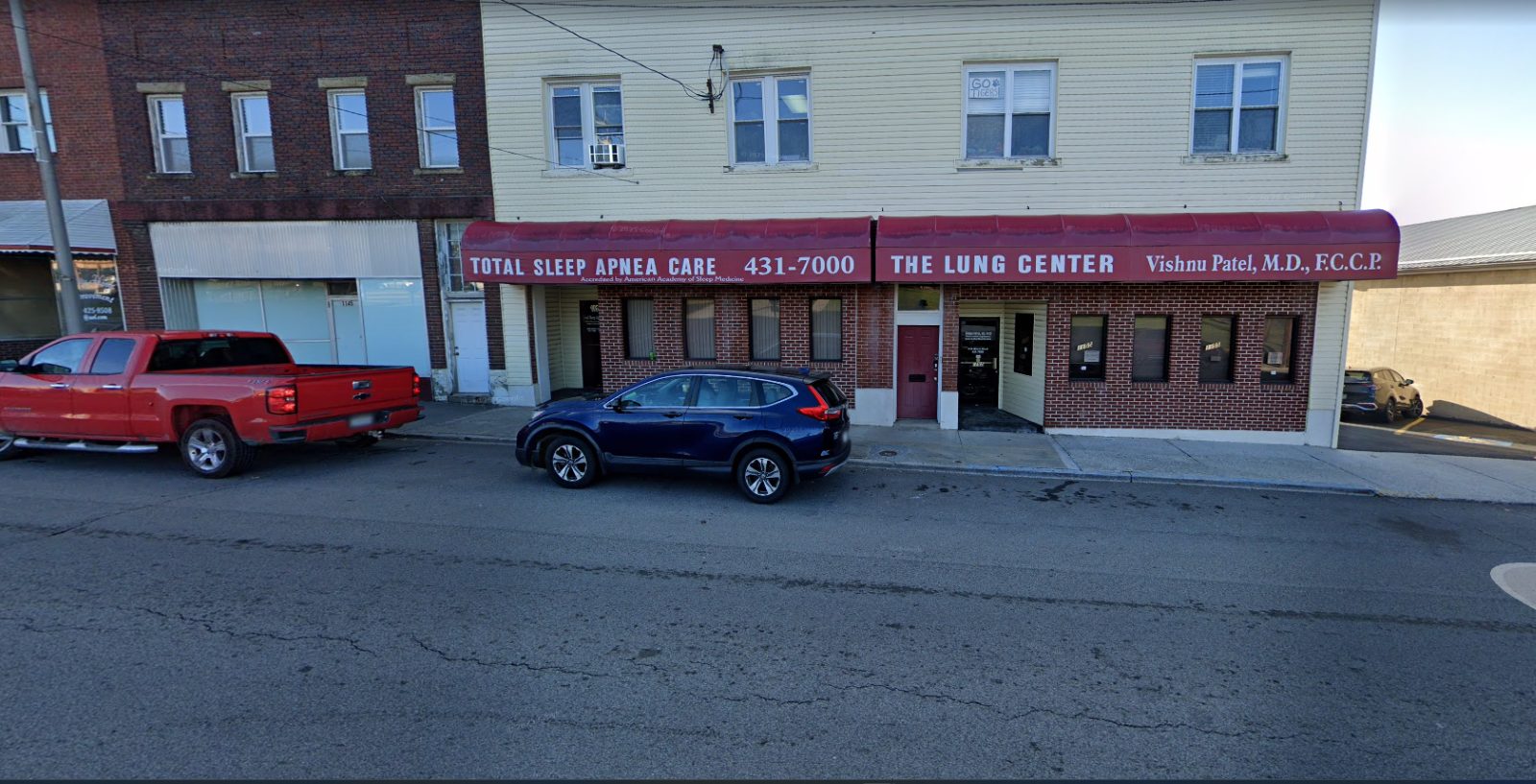 Street view of the building at 1155 Mercer Street: two red awnings reading Total Sleep Apnea Care and The Lung Center